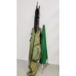 A QUANTITY OF FISHING RODS IN STEAD FAST 2000 CARRY CASE ALONG WITH LARGE FISHING UMBRELLA.