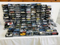 APPROX 134 DIE-CAST MODEL VEHICLES RELATING TO "JAMES BOND 007" IN ORIGINAL DISPLAY CASES ALONG