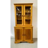 A HONEY PINE GLAZED TOP DRESSER W 91CM, D 43CM, H 190CM.