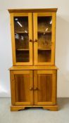 A HONEY PINE GLAZED TOP DRESSER W 91CM, D 43CM, H 190CM.