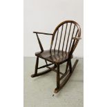 A CHILD'S ELM SEAT STICK BACK ROCKING CHAIR