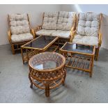 A SUITE OF CANE CONSERVATORY FURNITURE TO INCLUDE TWO CHAIRS, TWO SEATER SOFA,