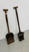 TWO ANTIQUE WOOD AND LEATHER SHOVELS WITH METAL WORK DETAIL L 98CM AND L 106CM.