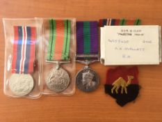 WW2 GROUP OF THREE, DEFENCE, WAR MEDAL AND GSM WITH PALESTINE 1945-48 BAR NAMED TO 14955635 GNR A.E.