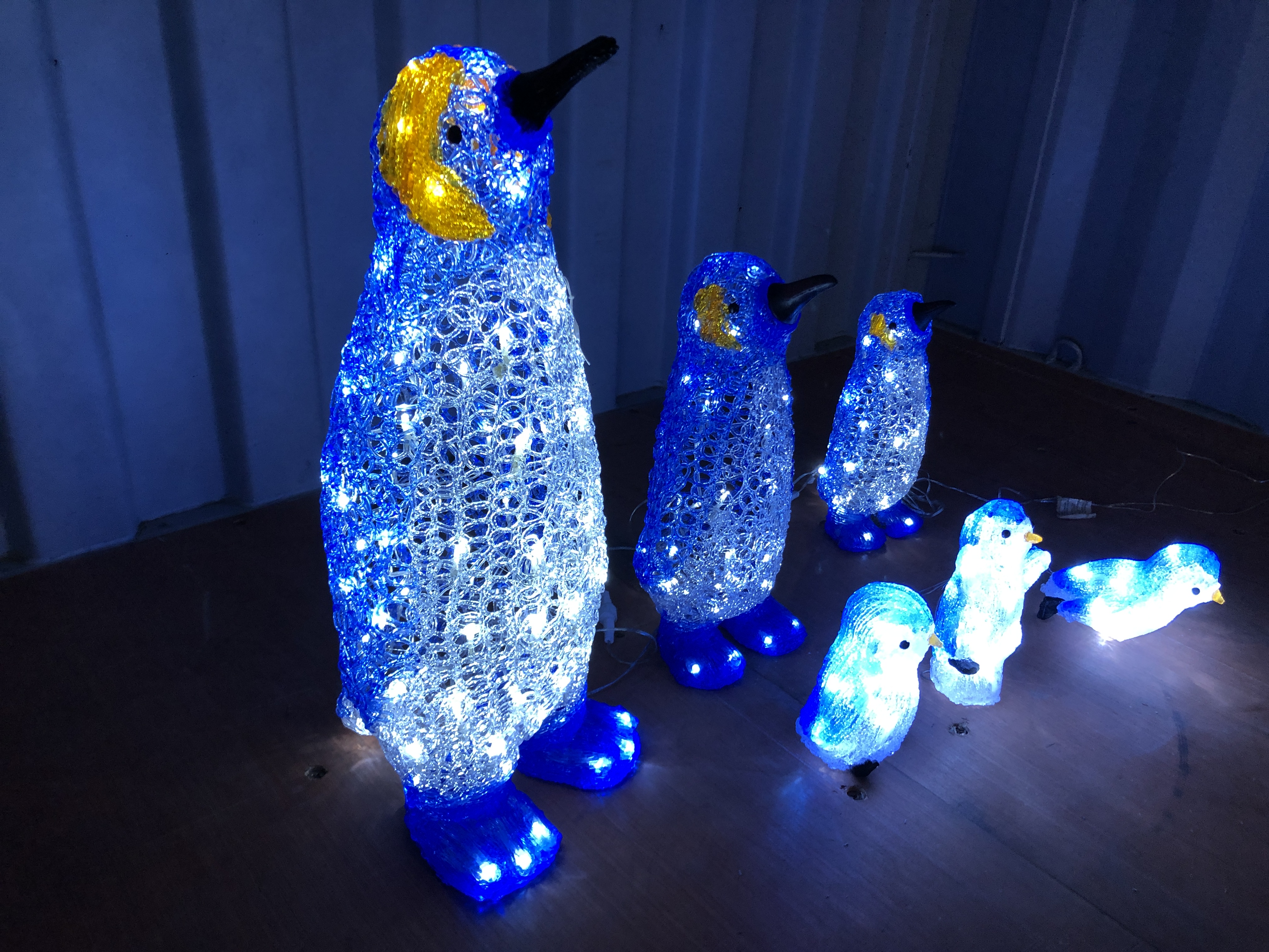 A GRADUATED SET OF THREE CHRISTMAS LED LIGHT UP PENGUINS (TALLEST 64CM. - Image 2 of 4