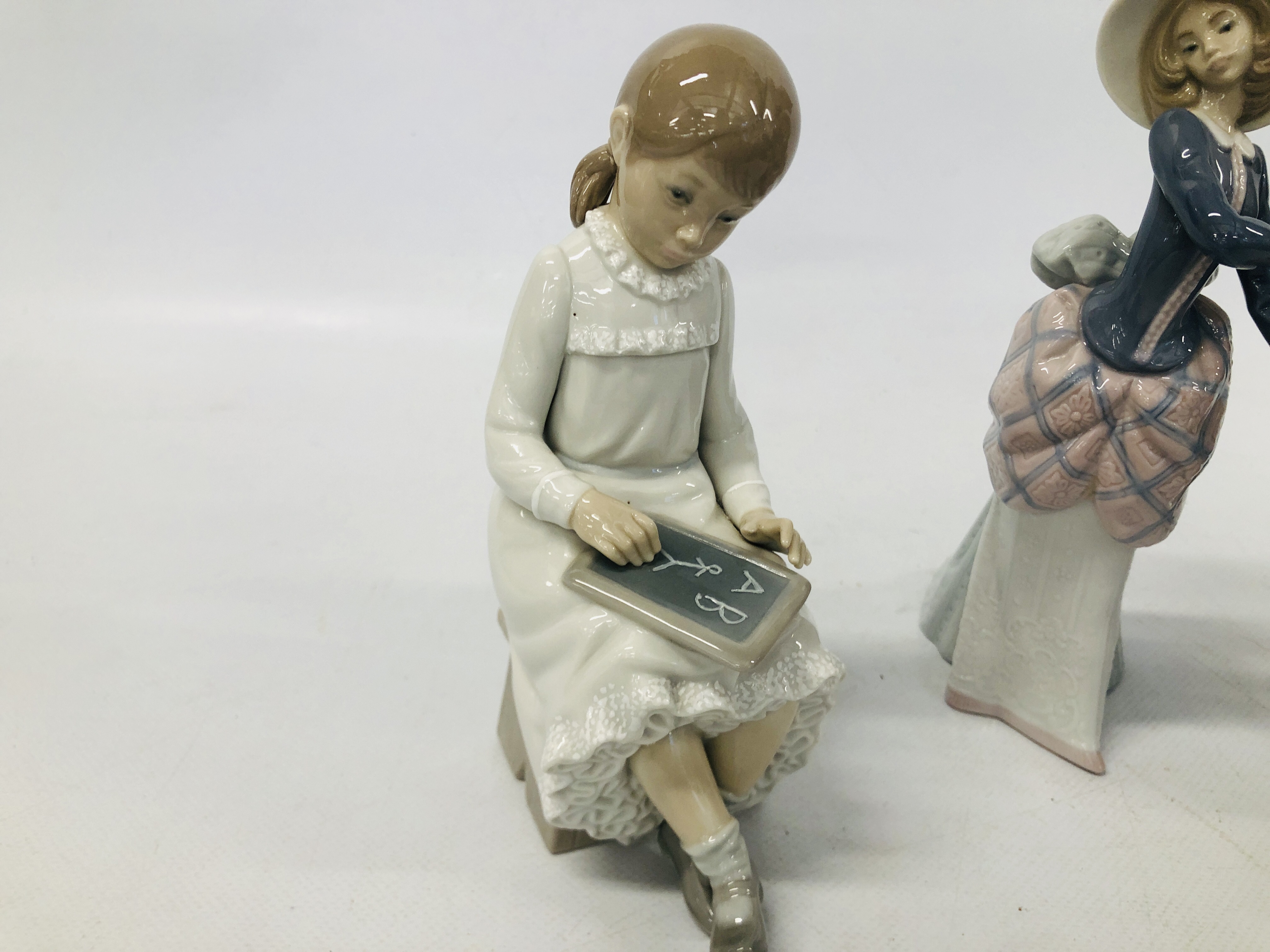 THREE LLADRO FIGURES TO INCLUDE LADY WITH A PARASOL, YOUNG GIRL AND FLOWER BASKET, - Image 4 of 6