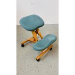 A BACK SUPPORT WHEELED KNEELING CHAIR.