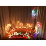 7 ASSORTED CHRISTMAS LED LIGHT DECORATIONS TO INCLUDE SANTA ON A TRAIN, SANTA STOP SIGN, TRAIN,