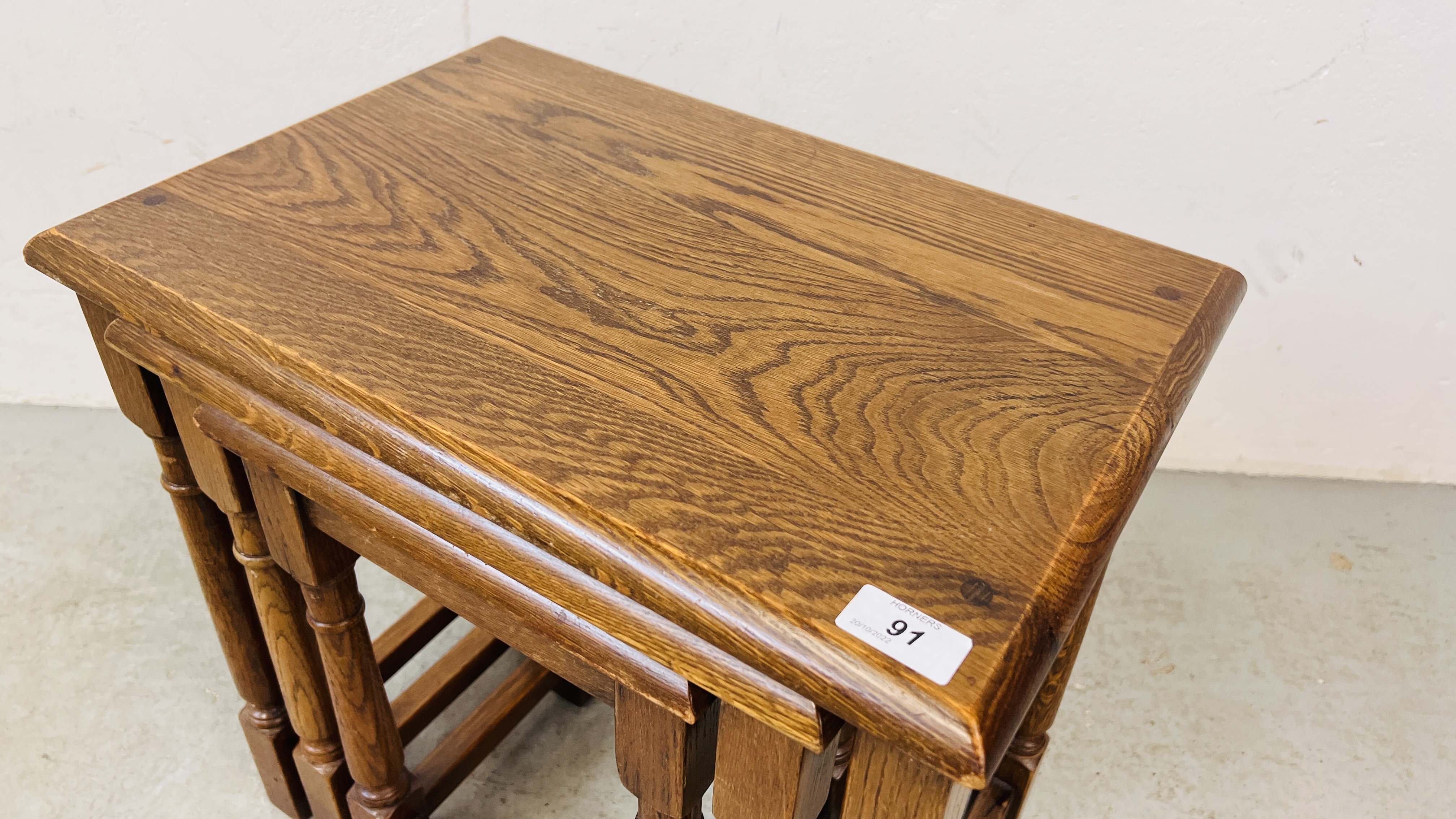 A SET OF GOOD QUALITY SOLID OAK NEST OF THREE TABLES. - Image 2 of 6