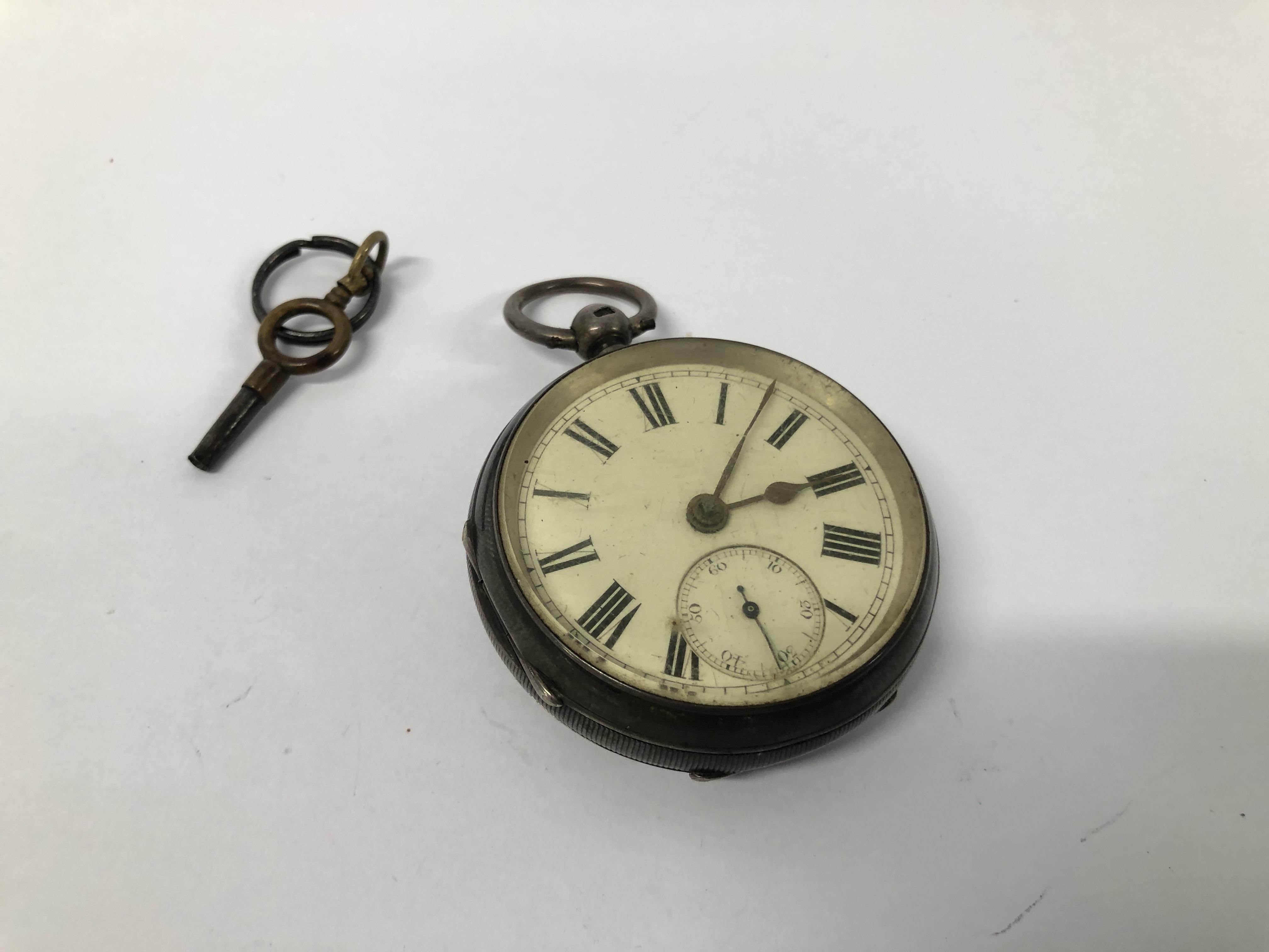A VINTAGE SILVER CASED POCKET WATCH WITH ENAMELLED DIAL
