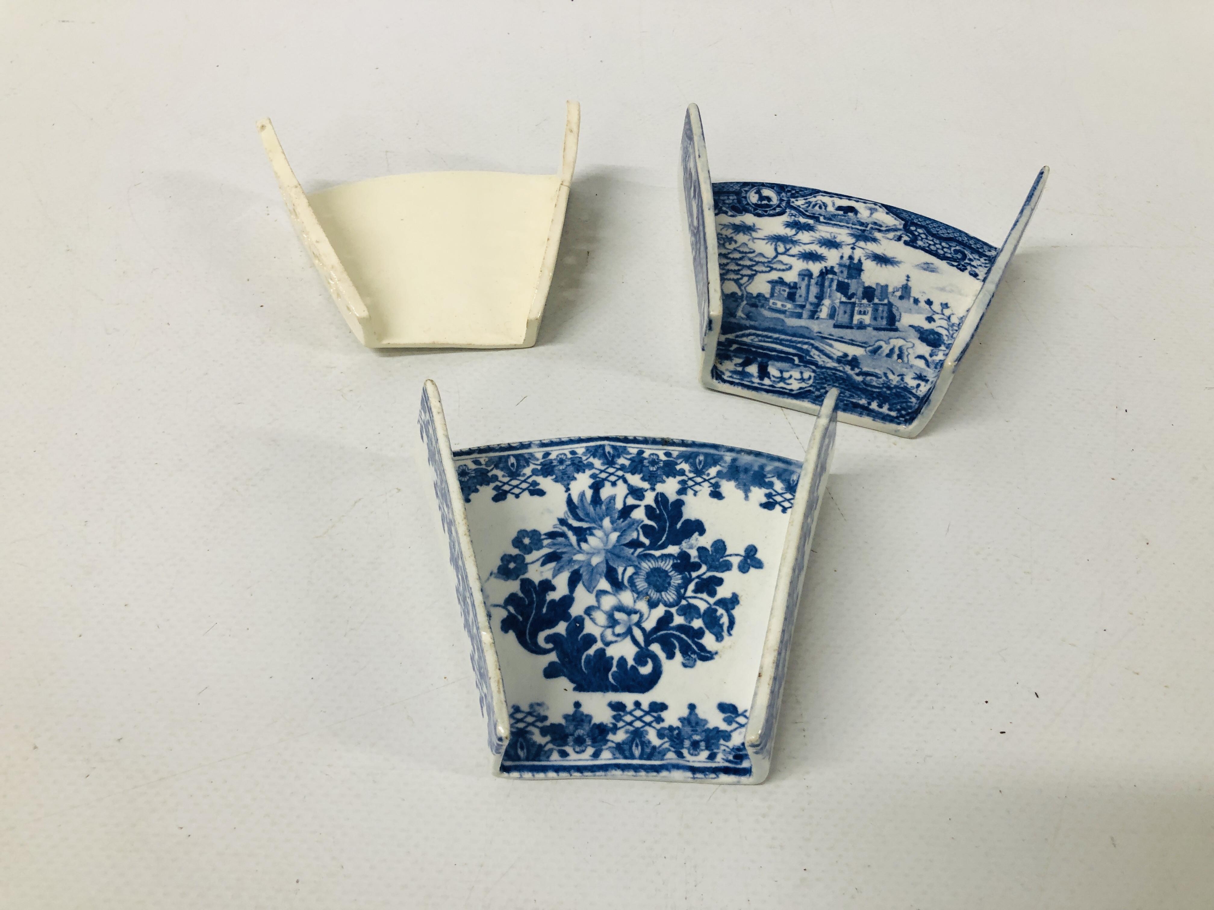 TWO SPODE BLUE AND WHITE ASPARAGUS SERVERS, ONE PRINTED WITH FLOWERS AND MARKED SPODE,