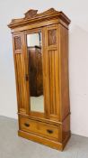 AN EDWARDIAN SATINWOOD SINGLE DOOR WARDROBE WITH CENTRAL MIRROR AND CARVED PANELS, DRAWER TO BASE,