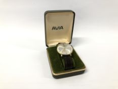 A BOXED AVIA GENTS WRIST WATCH ON LEATHER STRAP.