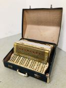 A VINTAGE JETELINA ACCORDION WITH HIGHLY DECORATIVE DETAILING IN HARD TRAVEL CASE.