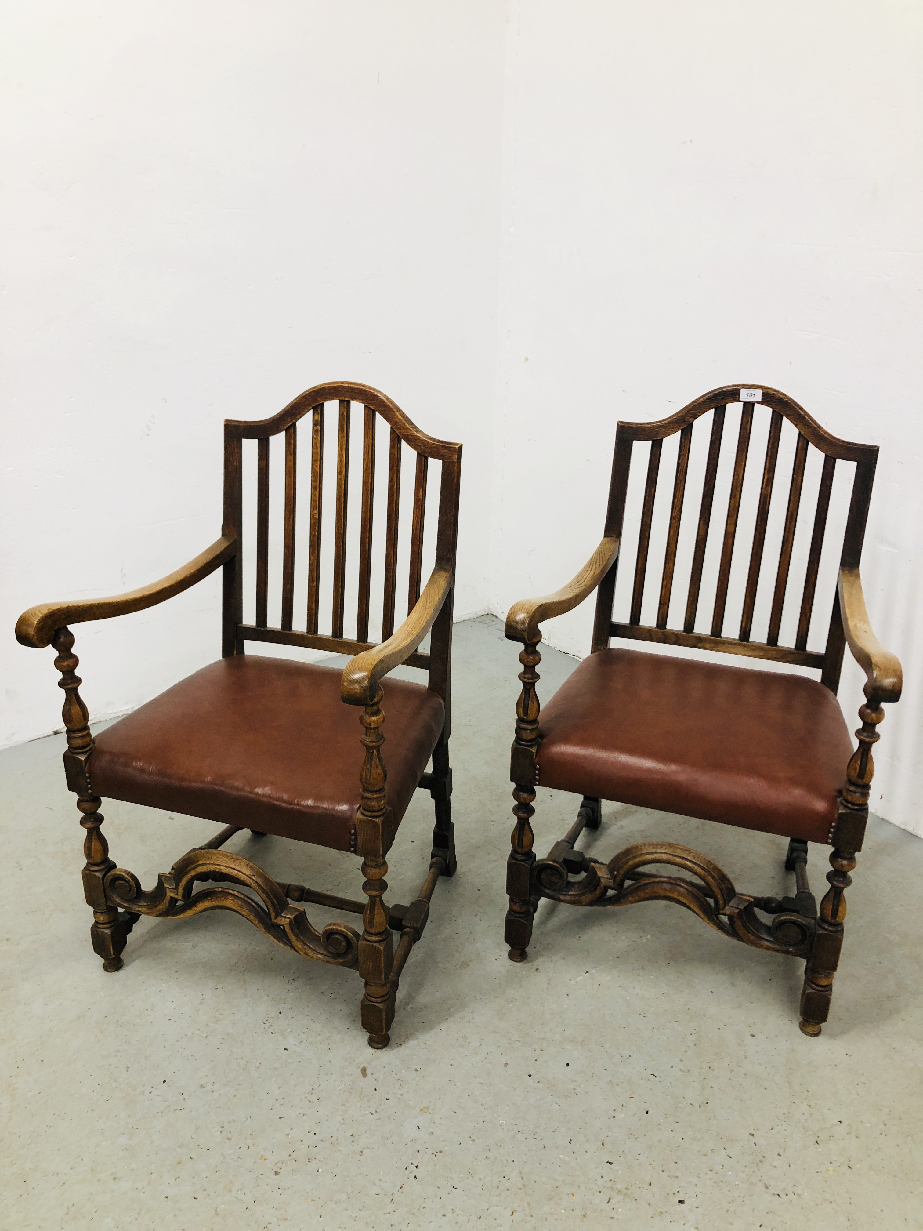 PAIR OF OAK FRAMED STRUNG BACK ELBOW CHAIRS WITH TANNED LEATHERETTE SEATS. - Image 2 of 6