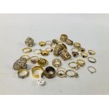 BOX OF GOLD TONE RINGS WITH A MIXTURE OF CRYSTAL STONES