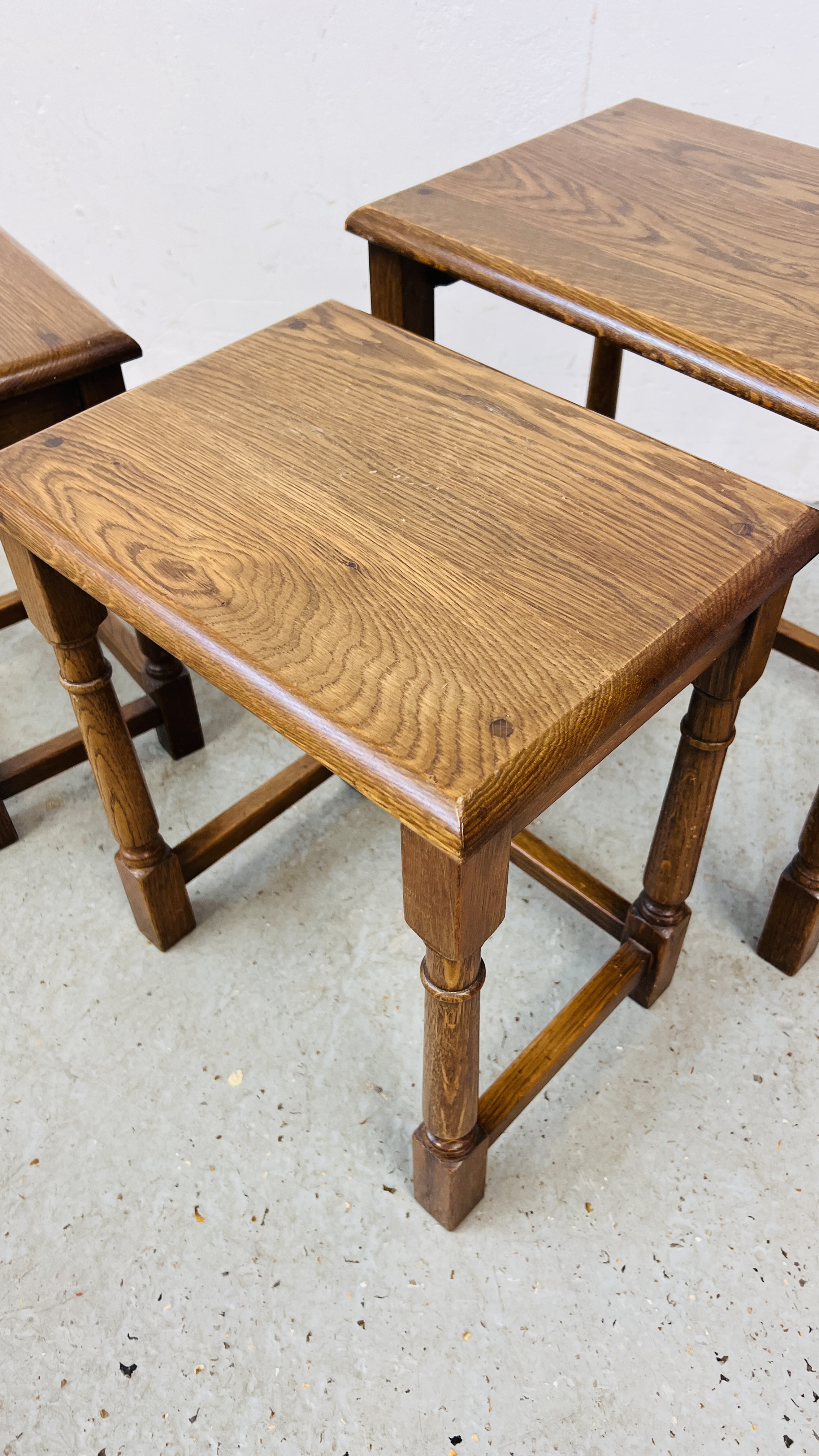 A SET OF GOOD QUALITY SOLID OAK NEST OF THREE TABLES. - Image 6 of 6