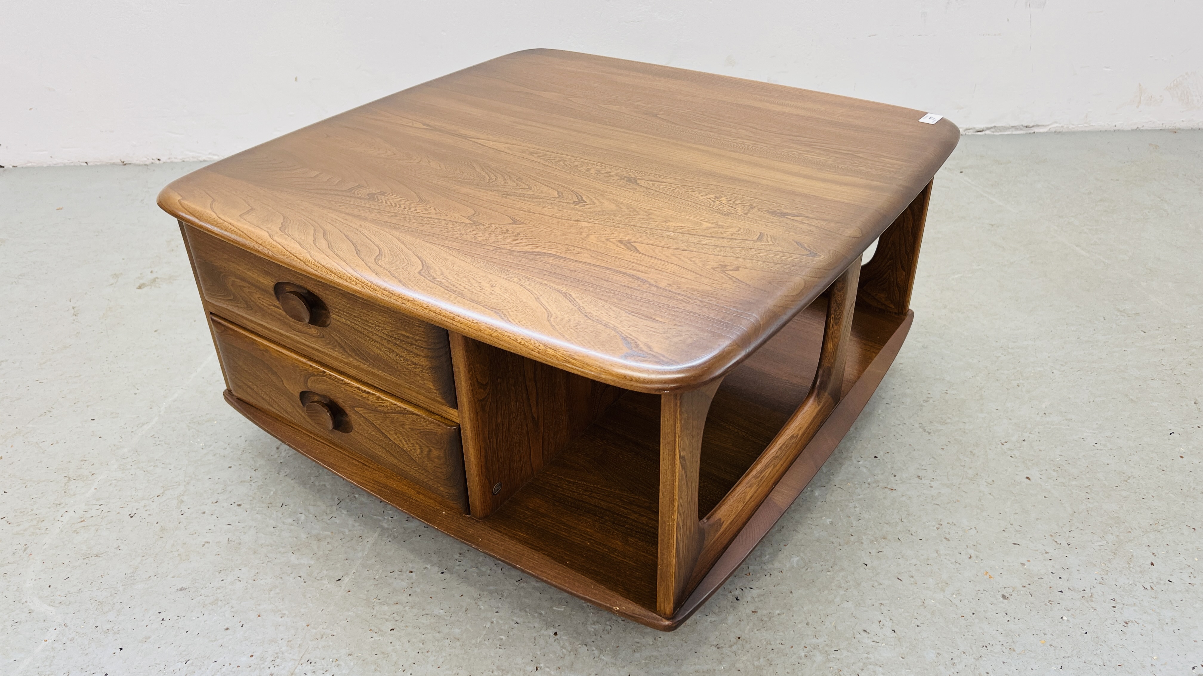 MID CENTURY ERCOL GOLDEN DAWN PANDORAS BOX COFFEE TABLE WITH TWO DRAWERS W 80CM, D 80CM, H 40CM.