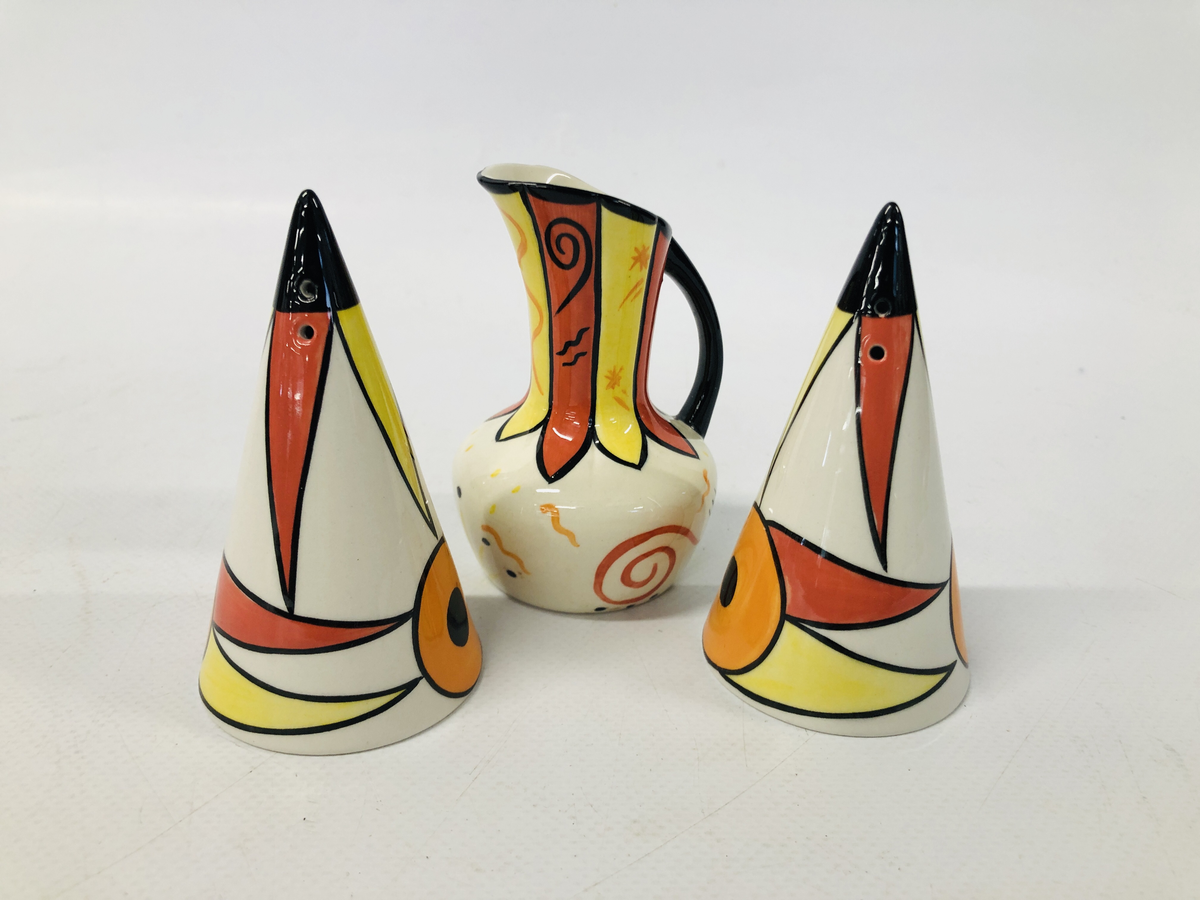 A 21st COLLECTORS EDITION MILK JUG AND SALT AND PEPPER SHAKERS SIGNED BY LORNA BAILEY, H 9CM.