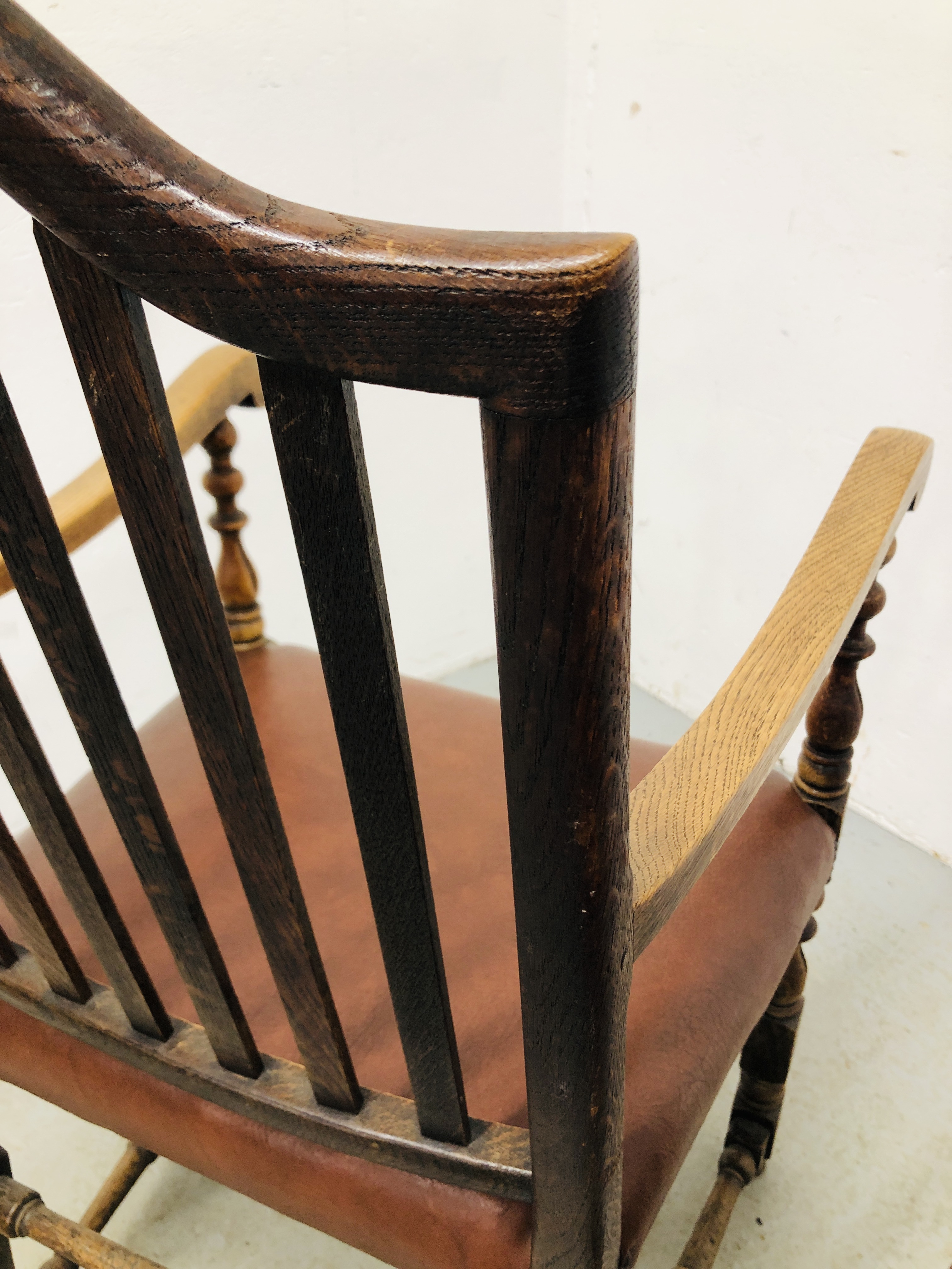 PAIR OF OAK FRAMED STRUNG BACK ELBOW CHAIRS WITH TANNED LEATHERETTE SEATS. - Image 6 of 6