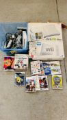 A Wii CONSOLE WITH GAMES AND ACCESSORIES - SOLD AS SEEN.