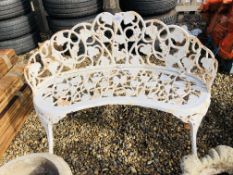 A DECORATIVE CAST IRON KIDNEY SHAPE GARDEN SEAT.