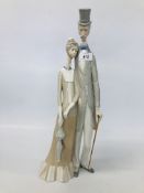 A LARGE LLADRO GROUP OF A LADY AND GENTLEMAN HEIGHT 49CM.