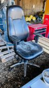 A BLACK FAUX LEATHER EXECUTIVE REVOLVING OFFICE CHAIR.