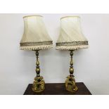 A PAIR OF VICTORIAN WOODEN CONVERTED CHURCH CANDLESTICK LAMPS WITH SHADES - SOLD AS SEEN.