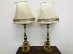 A PAIR OF VICTORIAN WOODEN CONVERTED CHURCH CANDLESTICK LAMPS WITH SHADES - SOLD AS SEEN.