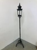 A METAL CRAFT LAMP IN THE STYLE OF AN OLD LANTERN - SOLD AS SEEN.