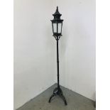 A METAL CRAFT LAMP IN THE STYLE OF AN OLD LANTERN - SOLD AS SEEN.