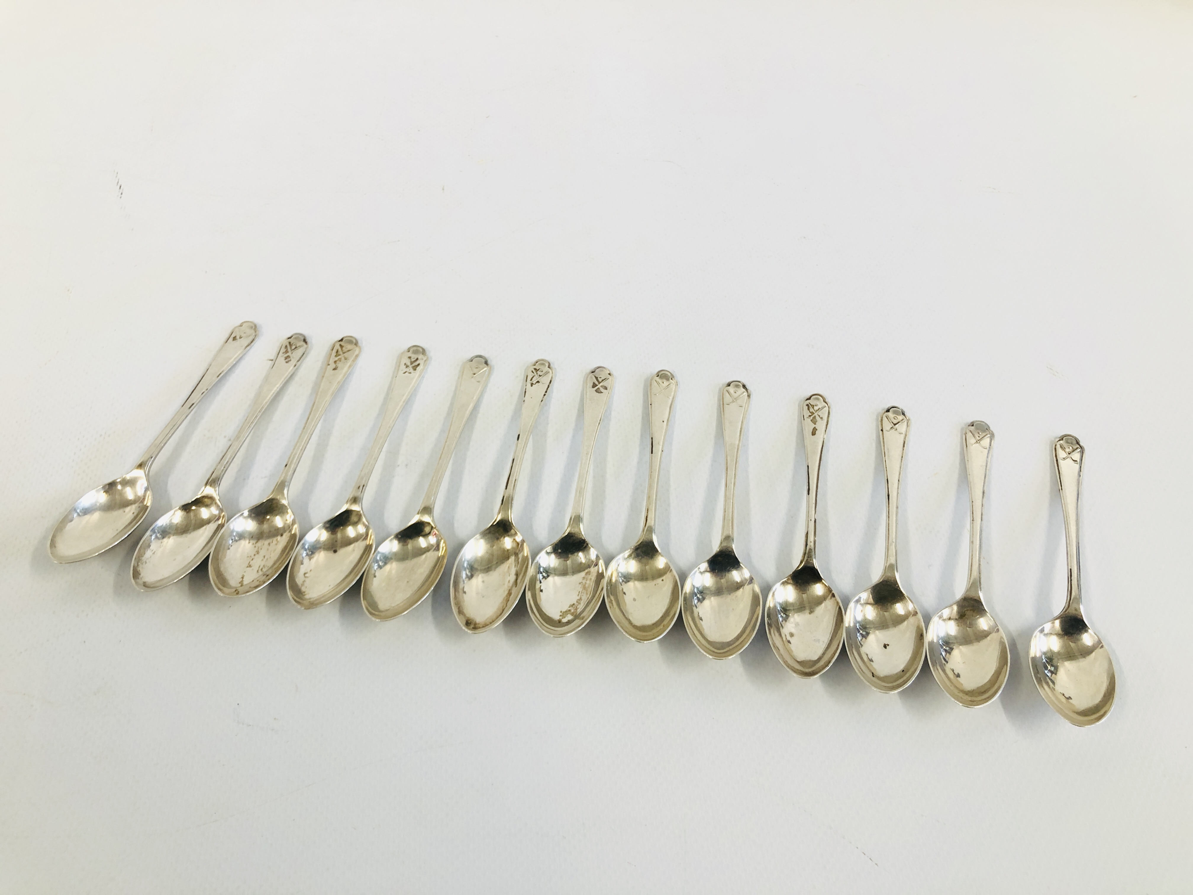 13 X SILVER EGG SPOONS WITH GOLF CLUB DETAIL SHEFFIELD ASSAY,
