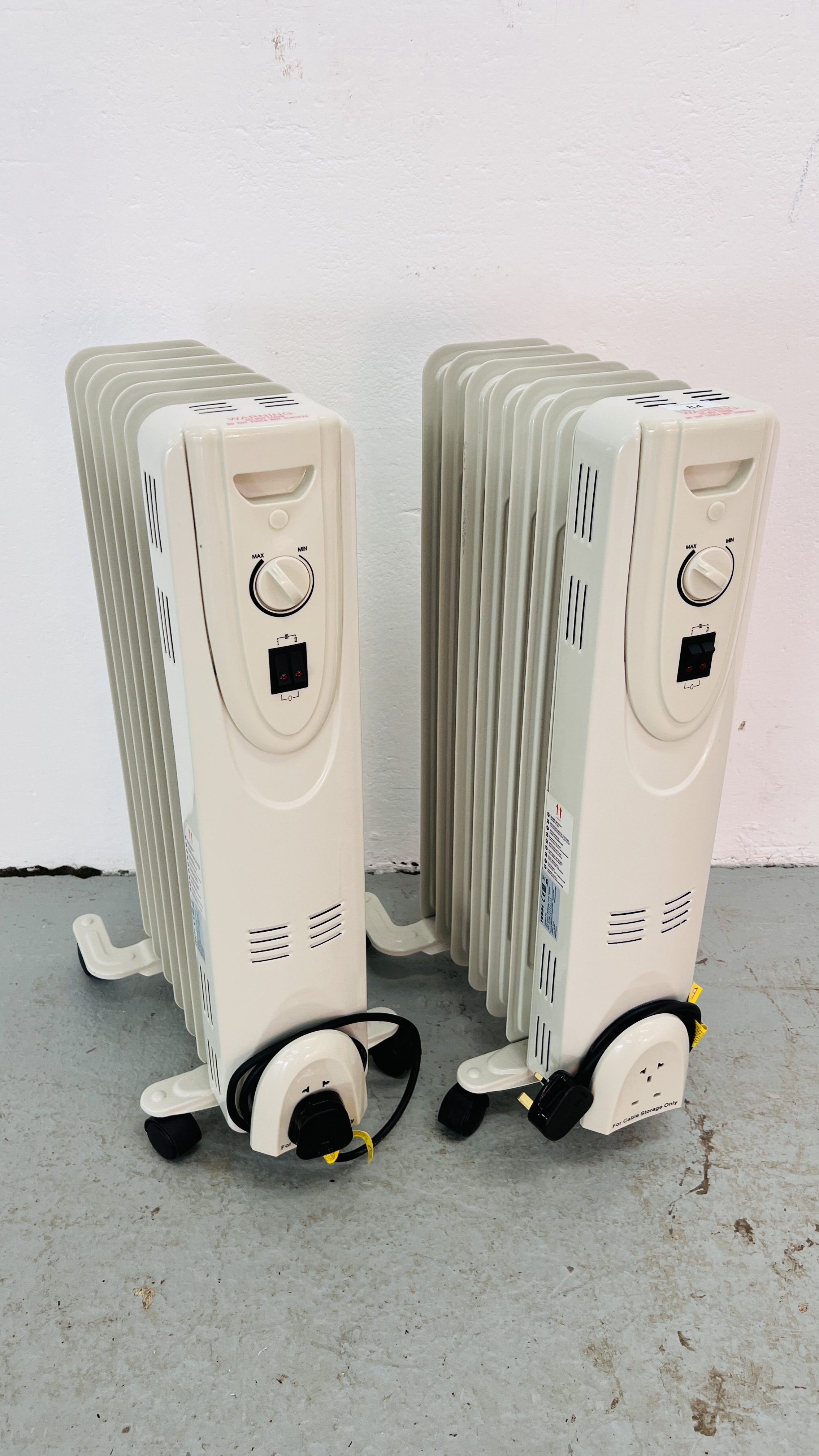 TWO ELECTRIC OIL FILLED RADIATORS - SOLD AS SEEN