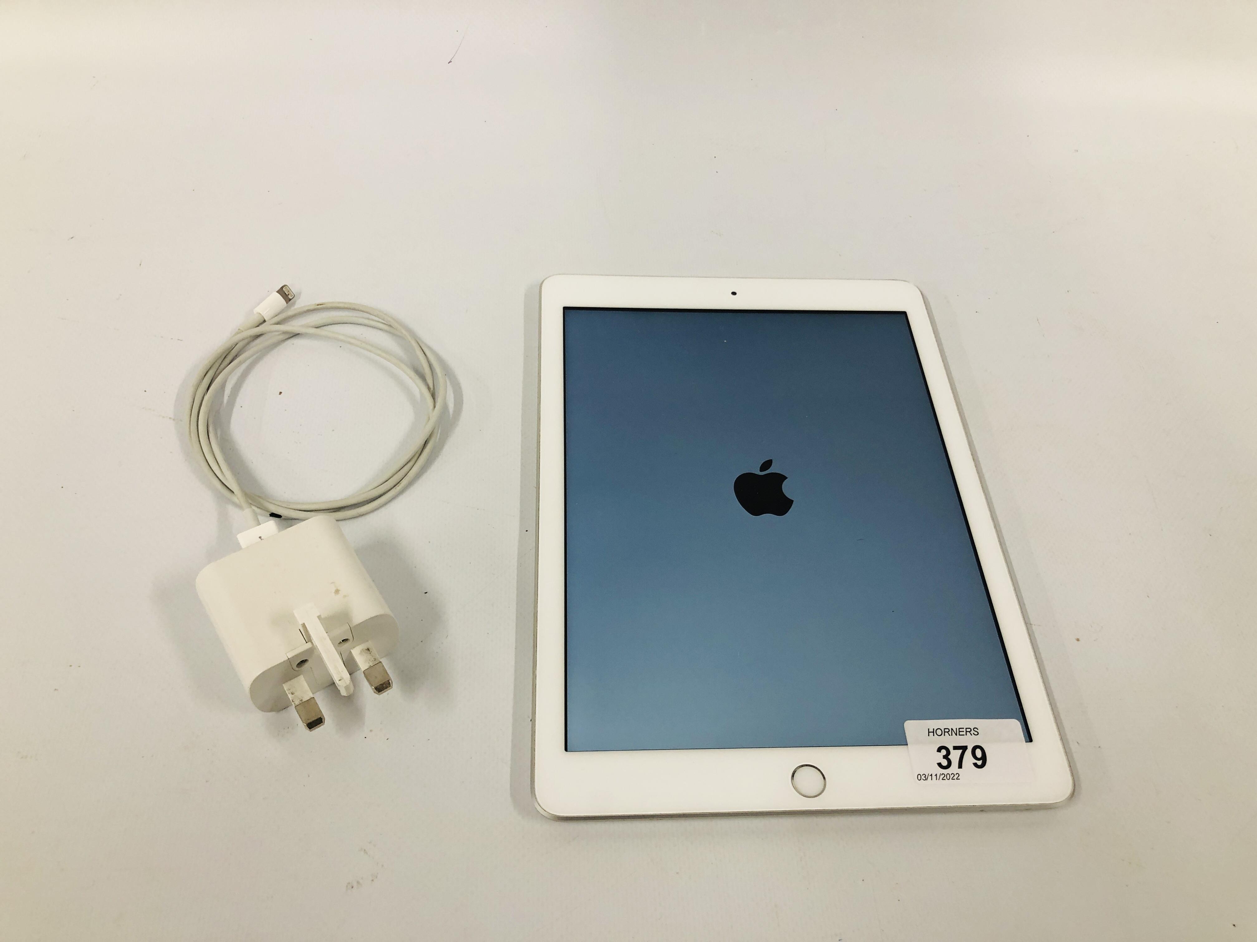 IPAD 6th GENERATION 32 GB MODEL MR7G2B/A, SN FX8JF8K AND CHARGER - SOLD AS SEEN.