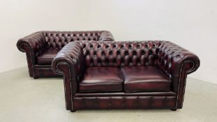 A PAIR OF MODERN OXBLOOD LEATHER TWO SEATER CHESTERFIELD STYLE SOFA'S (BOTH IN VERY GOOD CONDITION)