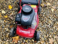 A GARDEN CARE PETROL DRIVEN ROTARY LAWN MOWER WITH GRASS COLLECTOR.