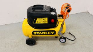 STANLEY AIR COMPRESSOR MODEL D200 WITH INSTRUCTIONS AND AIR LINE - SOLD AS SEEN.