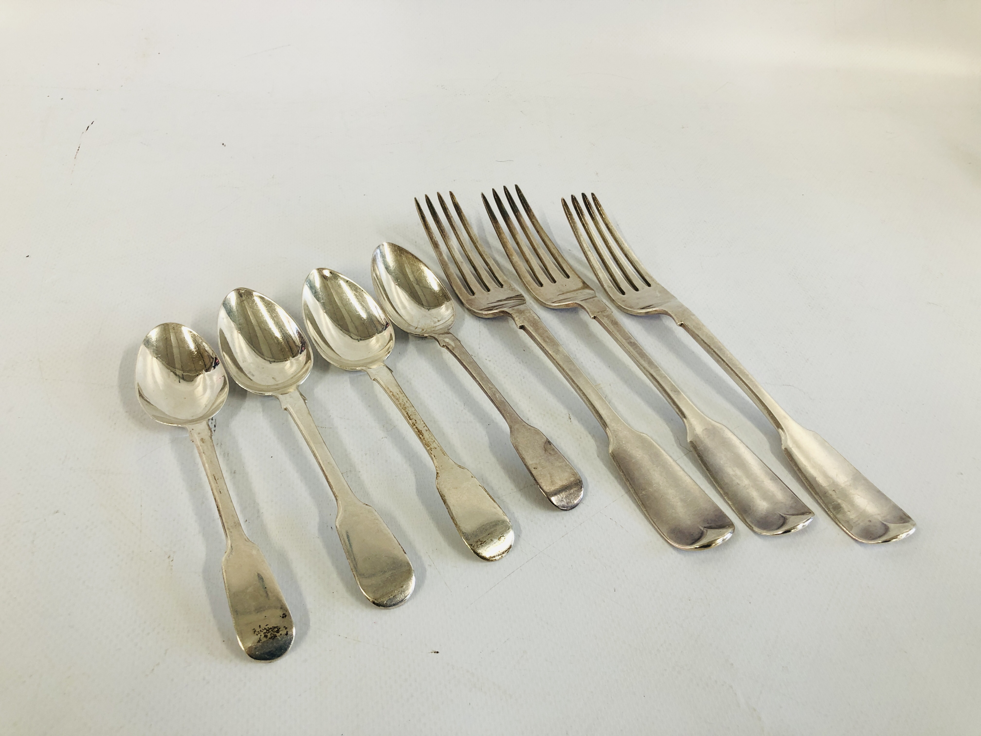 3 X LARGE SILVER FIDDLE PATTERN TABLE FORKS AND FOUR SILVER FIDDLE PATTERN TEASPOONS
