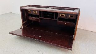 A MAHOGANY SECTION OF A GLOBE WERNICKE STYLE BOOKCASE WITH FITTED INTERIOR CONTAINING DRAWERS AND