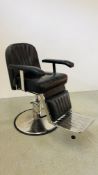 A LEATHER BARBERS CHAIR ON STAINLESS STEEL SUPPORT.