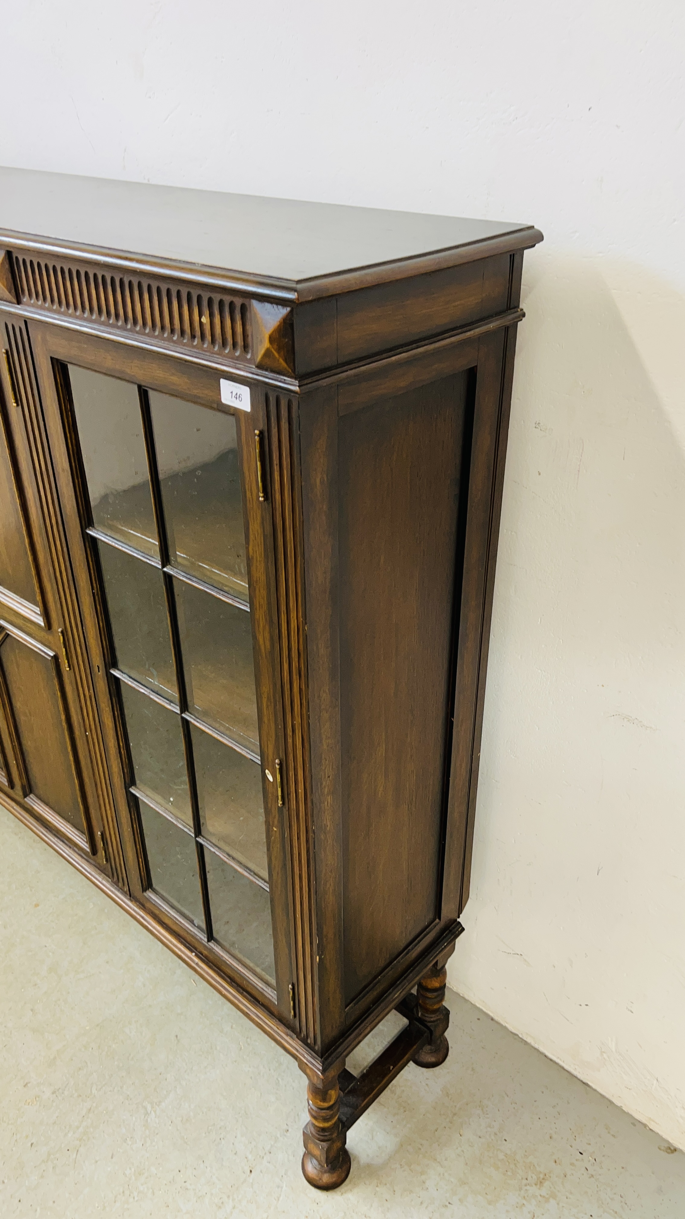 A 1930's OAK THREE DOOR CABINET STANDING ON LEG, - Image 3 of 13