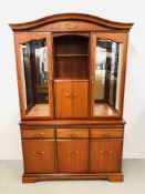 A GOOD QUALITY REPRODUCTION CHERRY WOOD FINISH DISPLAY CABINET ON THREE DRAWER THREE DOOR BASE.