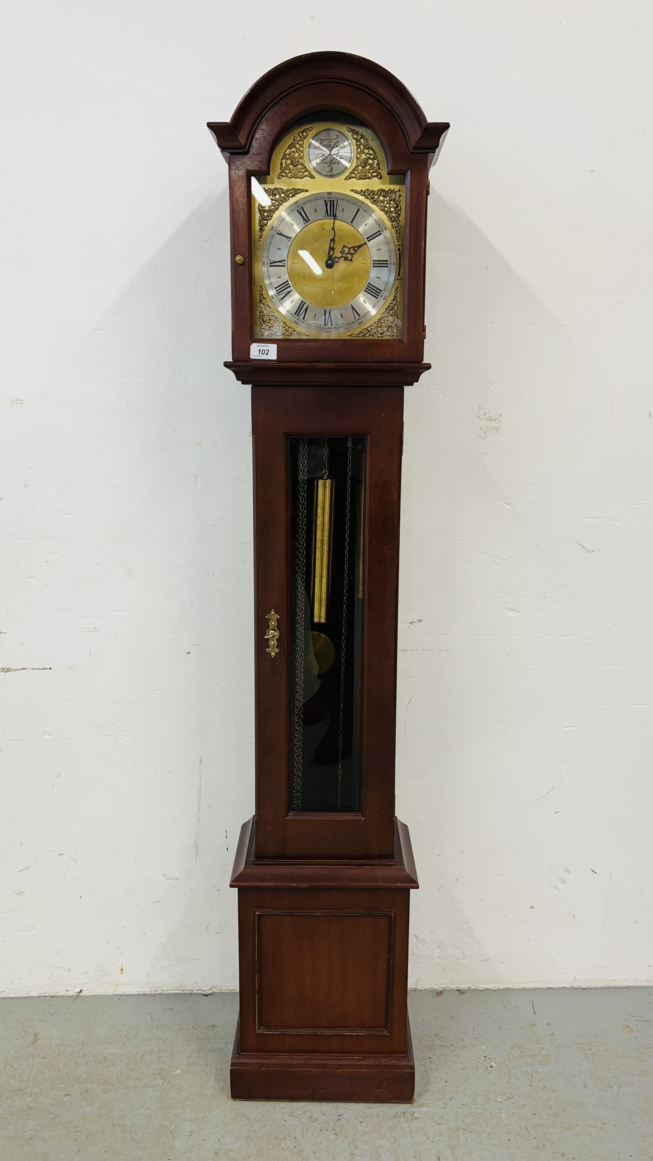 A REPRODUCTION MAHOGANY CASED GRANDMOTHER CLOCK THE DIAL MARKED TEMPESTFUGIT HEIGHT 162CM.