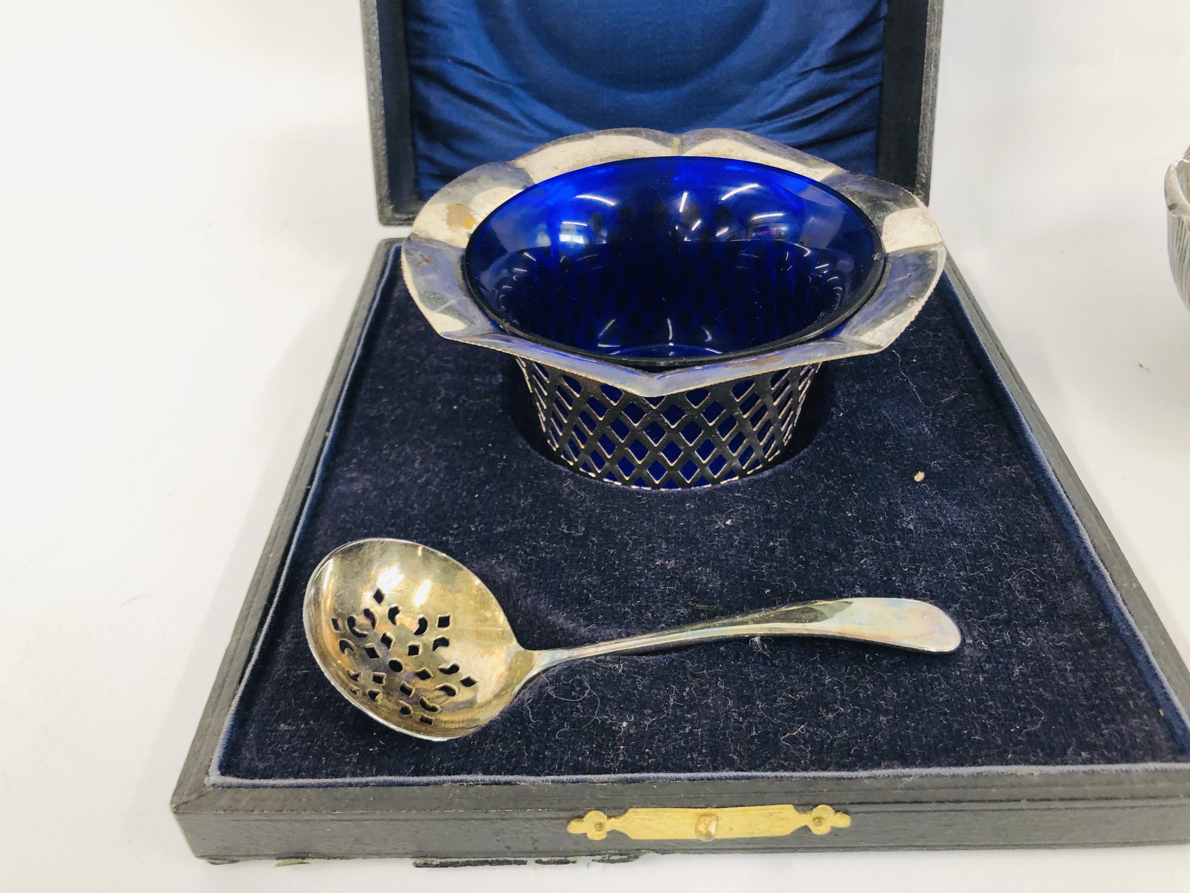 A PIERCED WHITE METAL BASKET WITH BLUE GLASS LINER WITH SILVER PLATED SIFTING LADLE IN PRESENTATION - Image 6 of 7