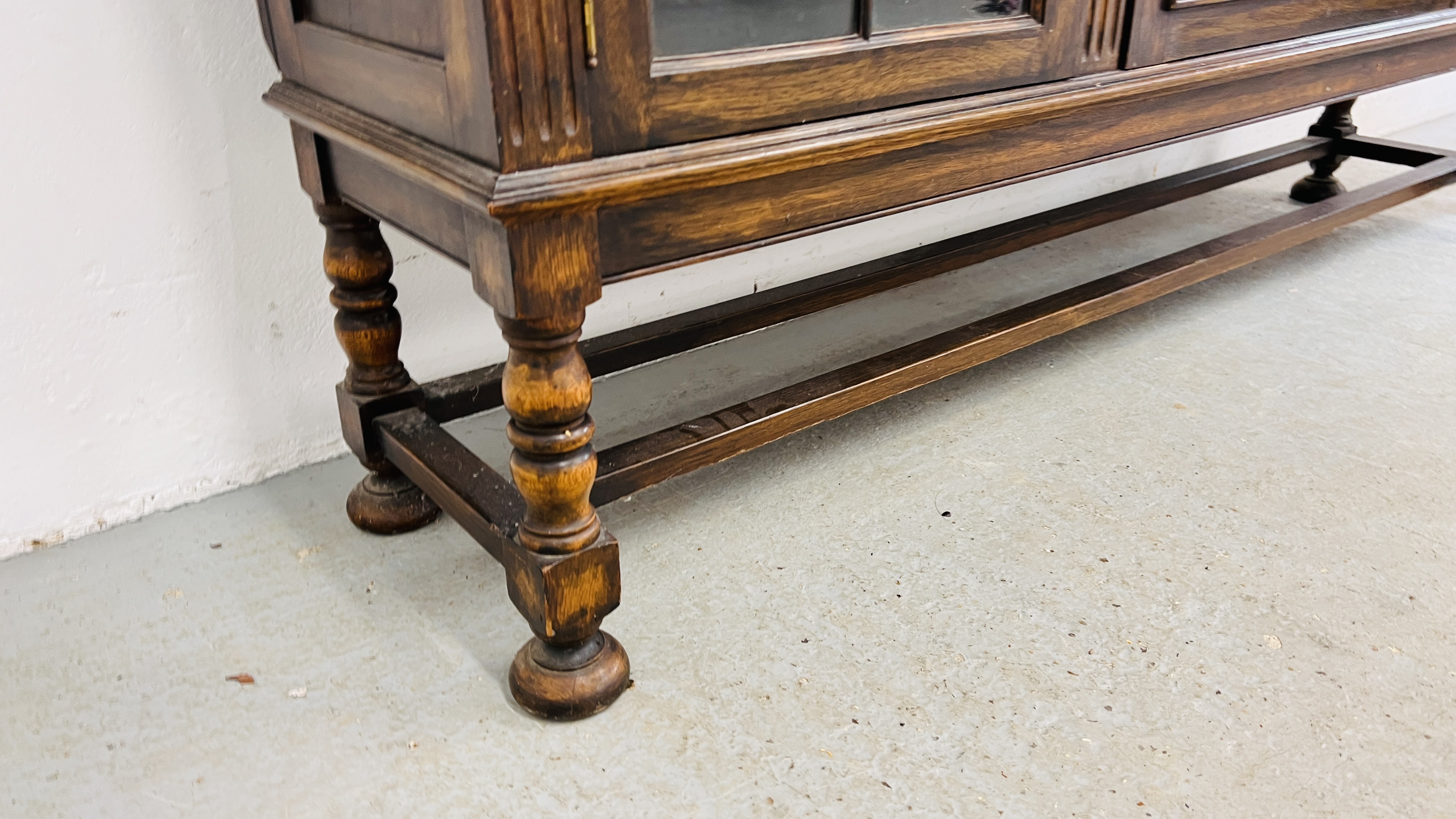 A 1930's OAK THREE DOOR CABINET STANDING ON LEG, - Image 8 of 13