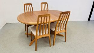 A RETRO TEAK BENNY LINDON DESIGN EXTENDING DINING TABLE AND FOUR CHAIRS