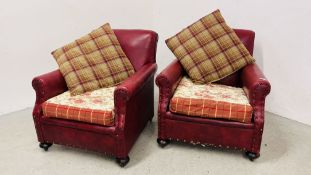 PAIR OF VINTAGE RED LEATHERETTE LOW ARMCHAIRS,