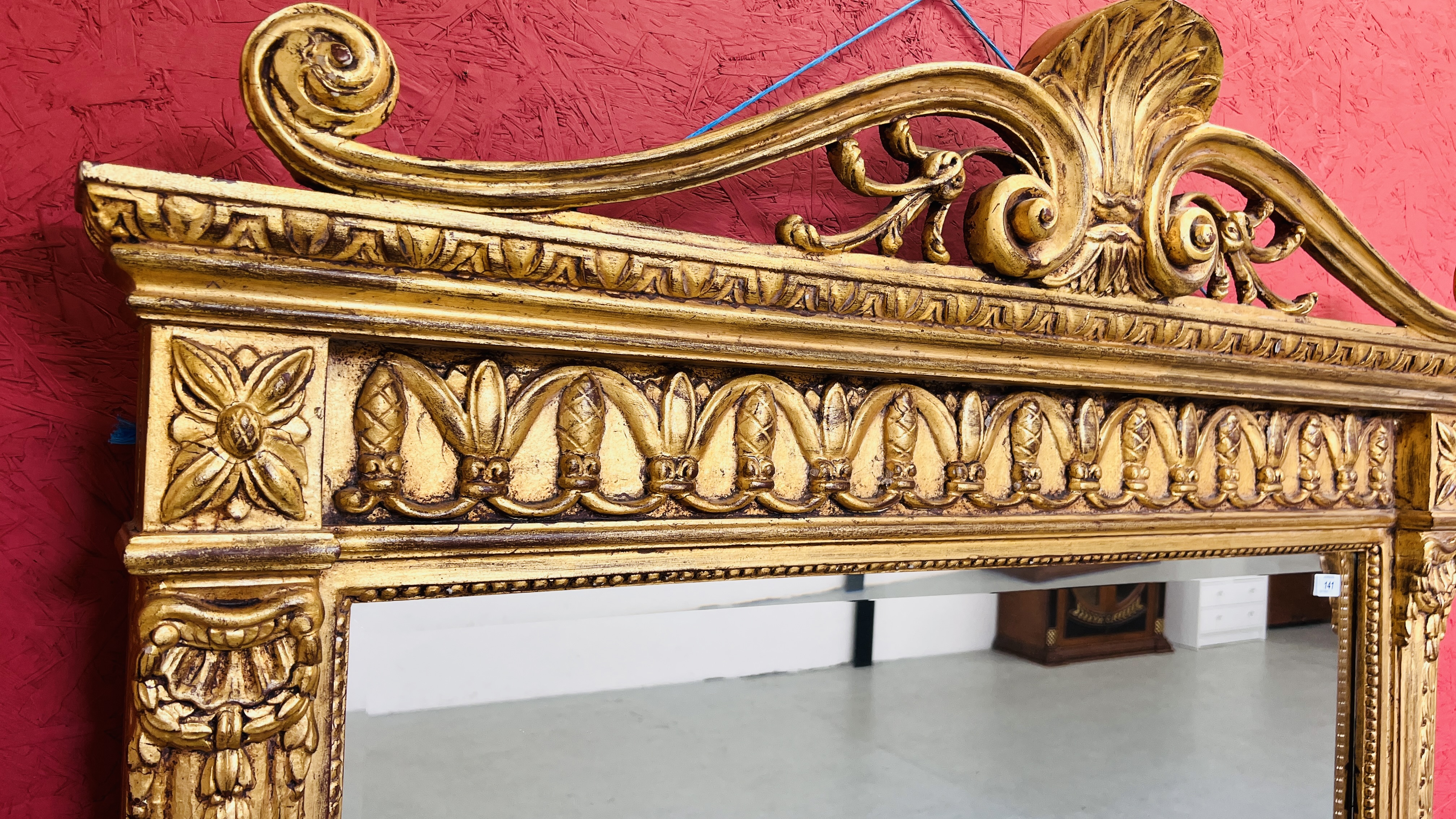 AN IMPRESSIVE GILT FINISH OVER MANTEL MIRROR WITH HEAVILY ORNATE DETAIL AND BEVELLED GLASS W 128CM, - Image 7 of 8