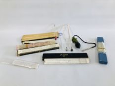 COLLECTION OF VINTAGE HYDROMETERS INCLUDING MERCURY, VARIOUS SLIDE RULES AND MEASURING INSTRUMENTS.